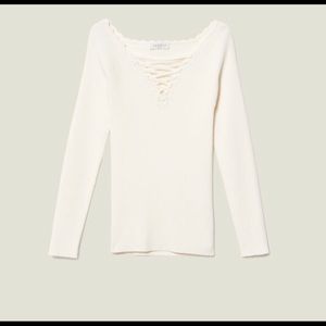 Sandro white top with lace up neck detail!